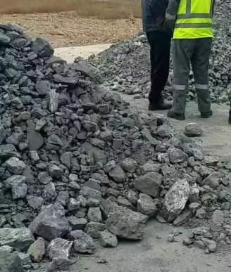 The staff is doing testing on the antimony ore at the site